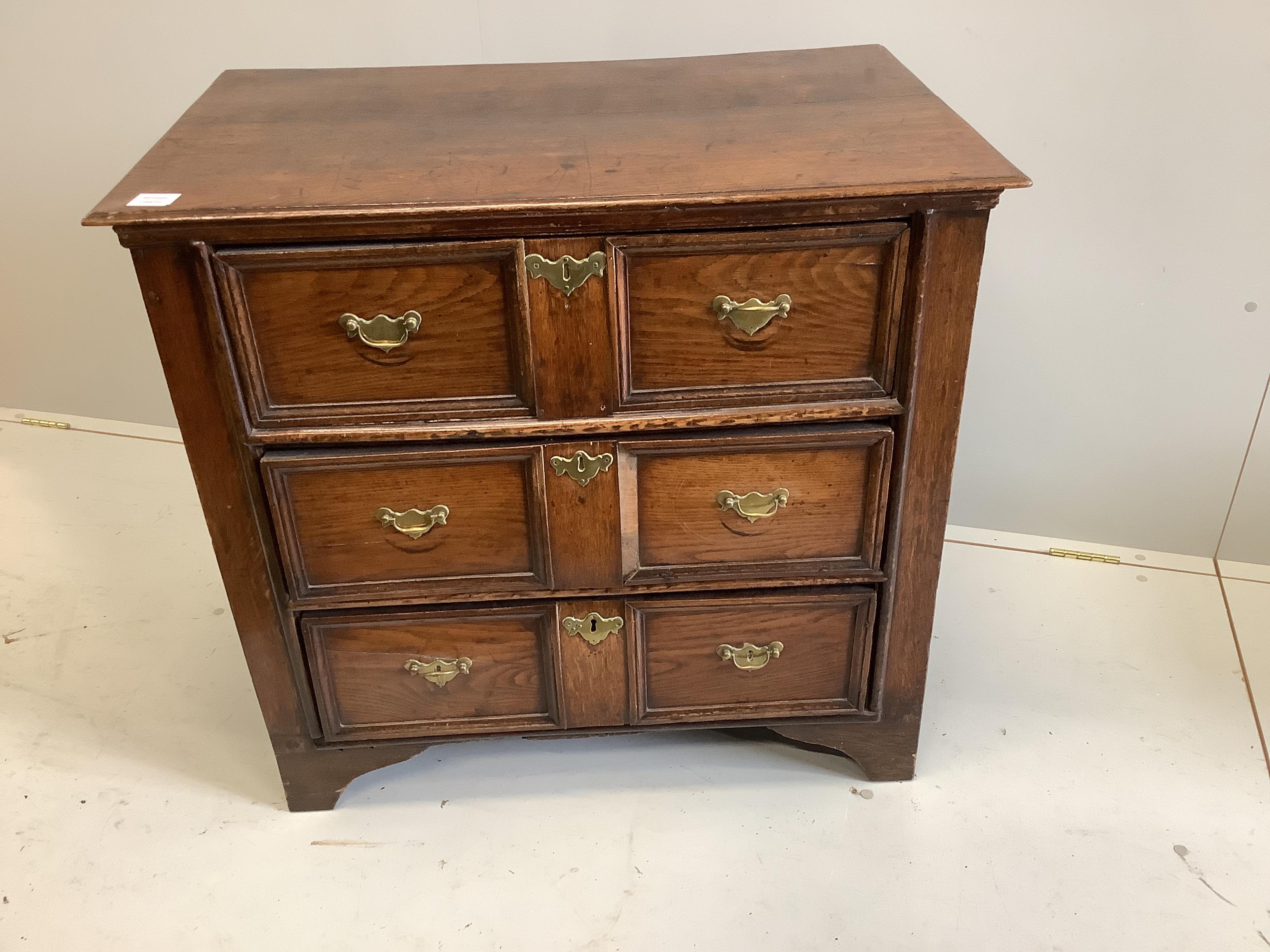 A small 18th century and later oak chest of three drawers, width 88cm, depth 55cm, height 82cm